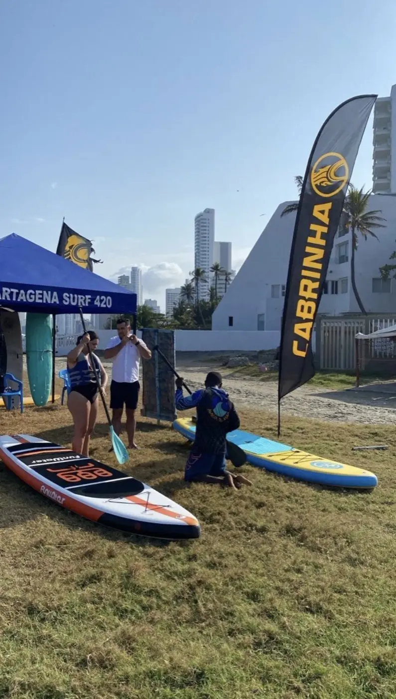 Paddleboard lesson setup on the beach